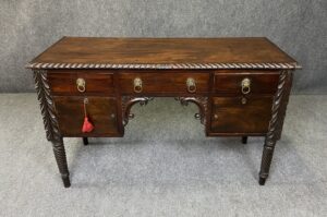 19th Century Flamed Mahogany Acanthus Carved Kneehole Desk