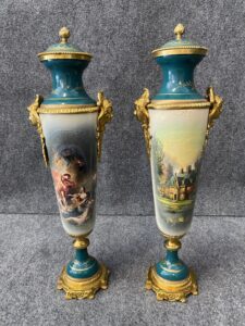 Pair of Sevres Style Bronze and Porcelain Urns with Lid