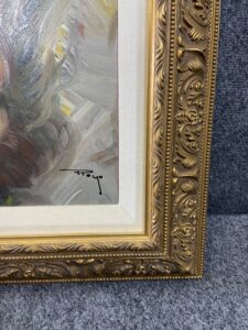 Print in Gold Frame of Girl /Woman Holding Flowers 