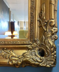 Beveled Mirror in Elaborate Gold Frame
