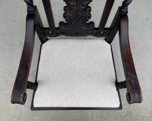 Late 1800's Solid Oak North Wind Face Accent Chair