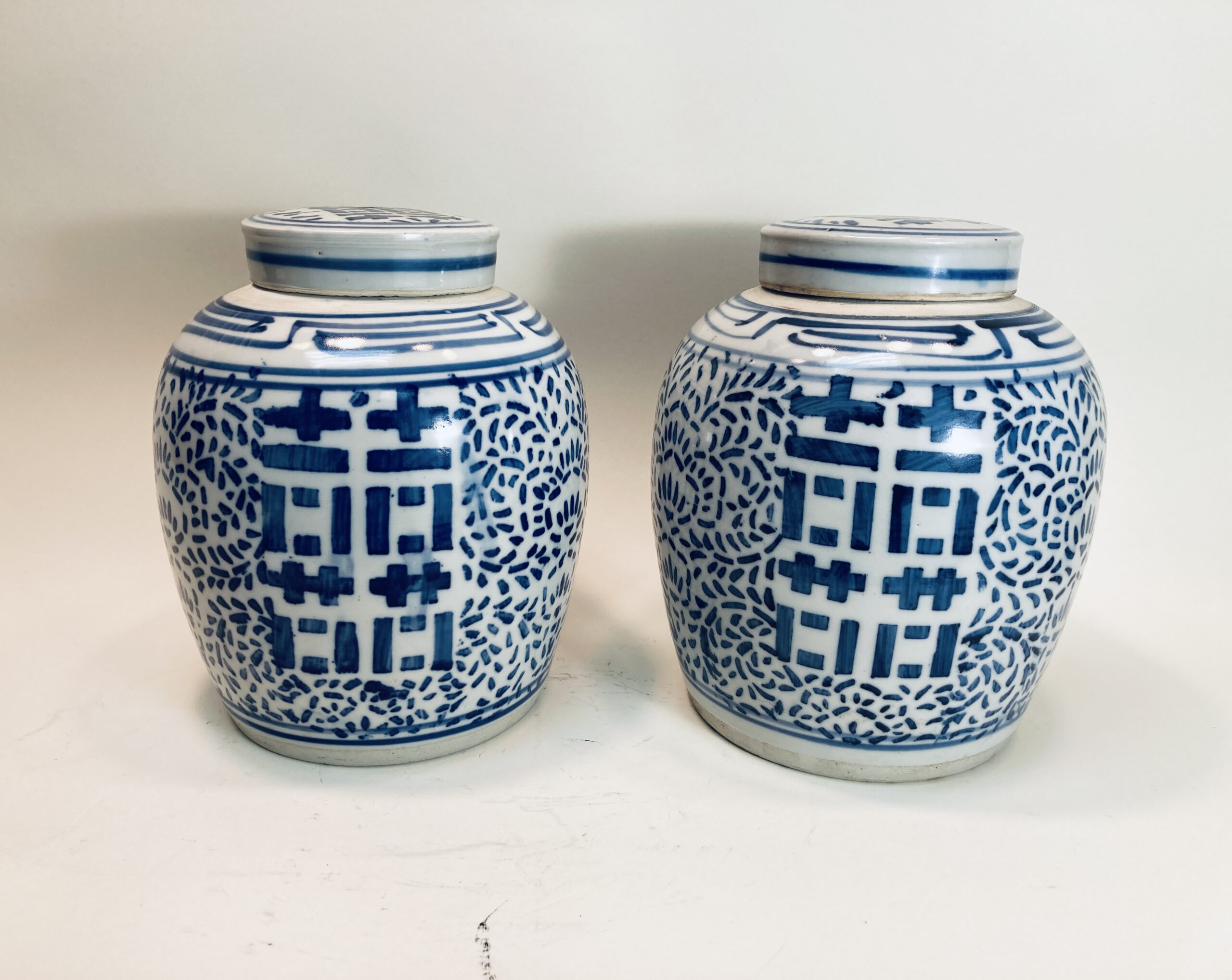 Pair of Chinese Blue and White 'Double Happiness' Jars with Lids Pair of Chinese Blue and White 'Double Happiness' Jars with Lids
