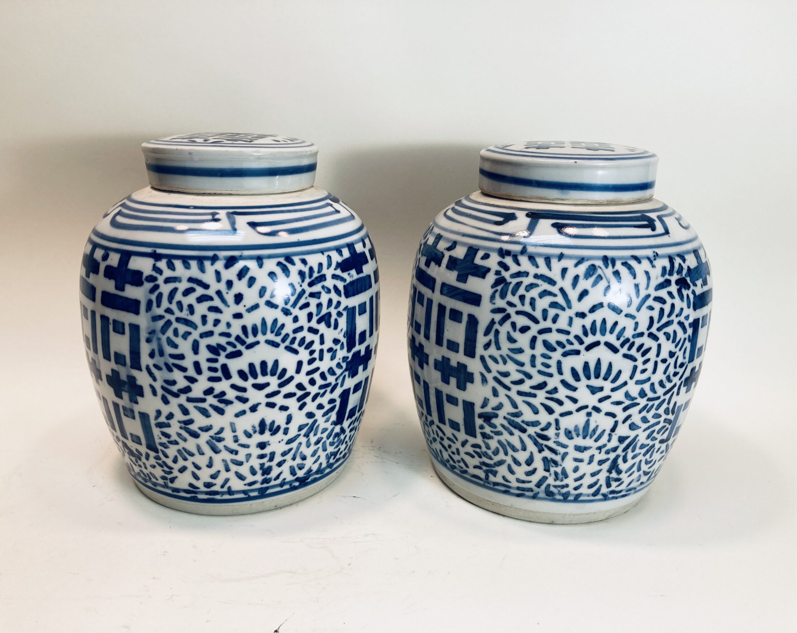 Pair of Chinese Blue and White 'Double Happiness' Jars with Lids Pair of Chinese Blue and White 'Double Happiness' Jars with Lids