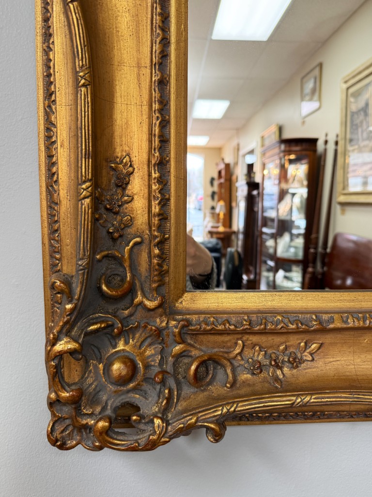 Heavily Carved Baroque-Style Gold Mirror Heavily Carved Baroque-Style Gold Mirror