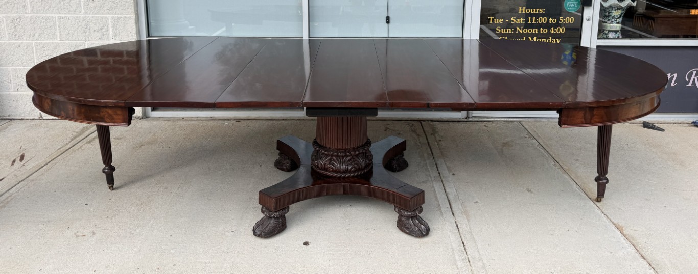 Antique Flamed Mahogany Acanthus-Carved 54in Round Pedestal Dining Table with 5 Leaves Antique Flamed Mahogany Acanthus-Carved 54in Round Pedestal Dining Table with 5 Leaves