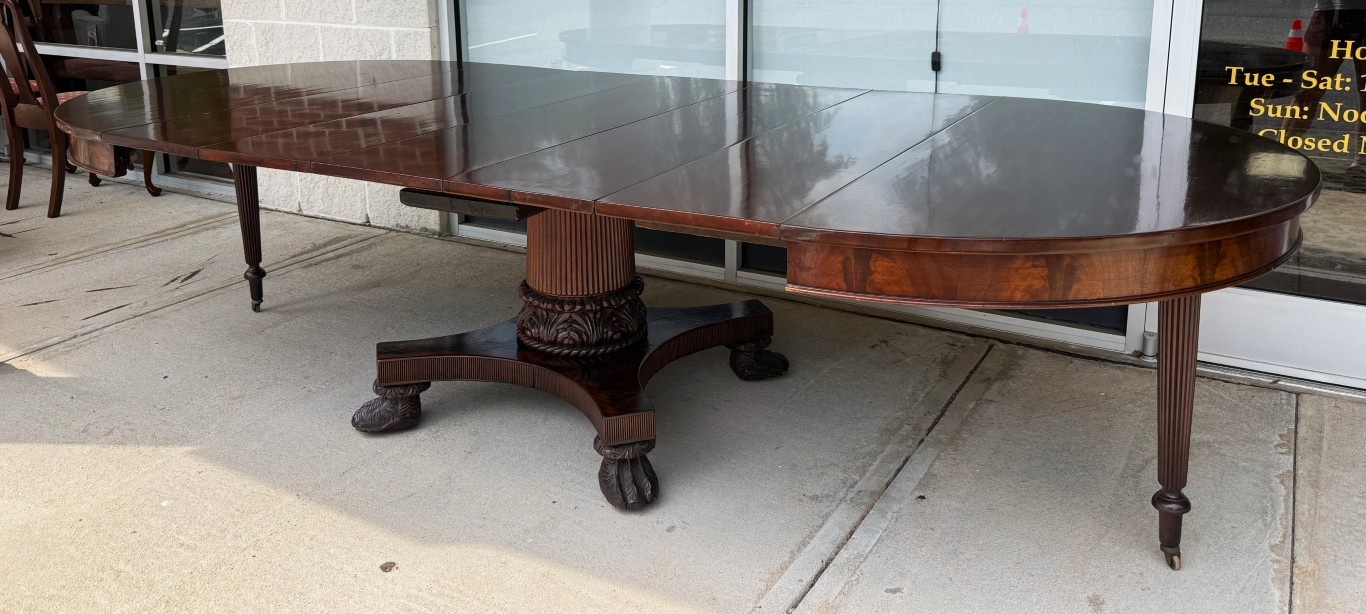 Antique Flamed Mahogany Acanthus-Carved 54in Round Pedestal Dining Table with 5 Leaves Antique Flamed Mahogany Acanthus-Carved 54in Round Pedestal Dining Table with 5 Leaves