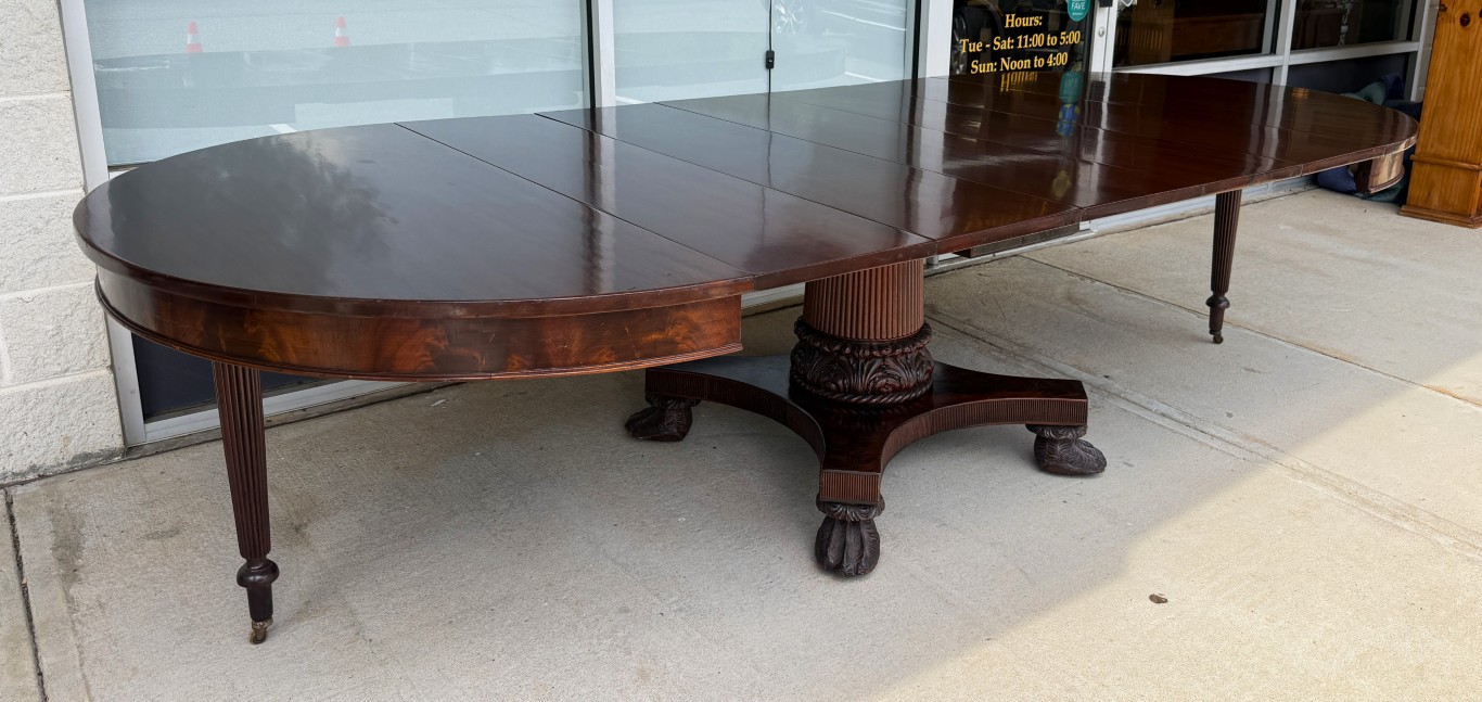 Antique Flamed Mahogany Acanthus-Carved 54in Round Pedestal Dining Table with 5 Leaves Antique Flamed Mahogany Acanthus-Carved 54in Round Pedestal Dining Table with 5 Leaves