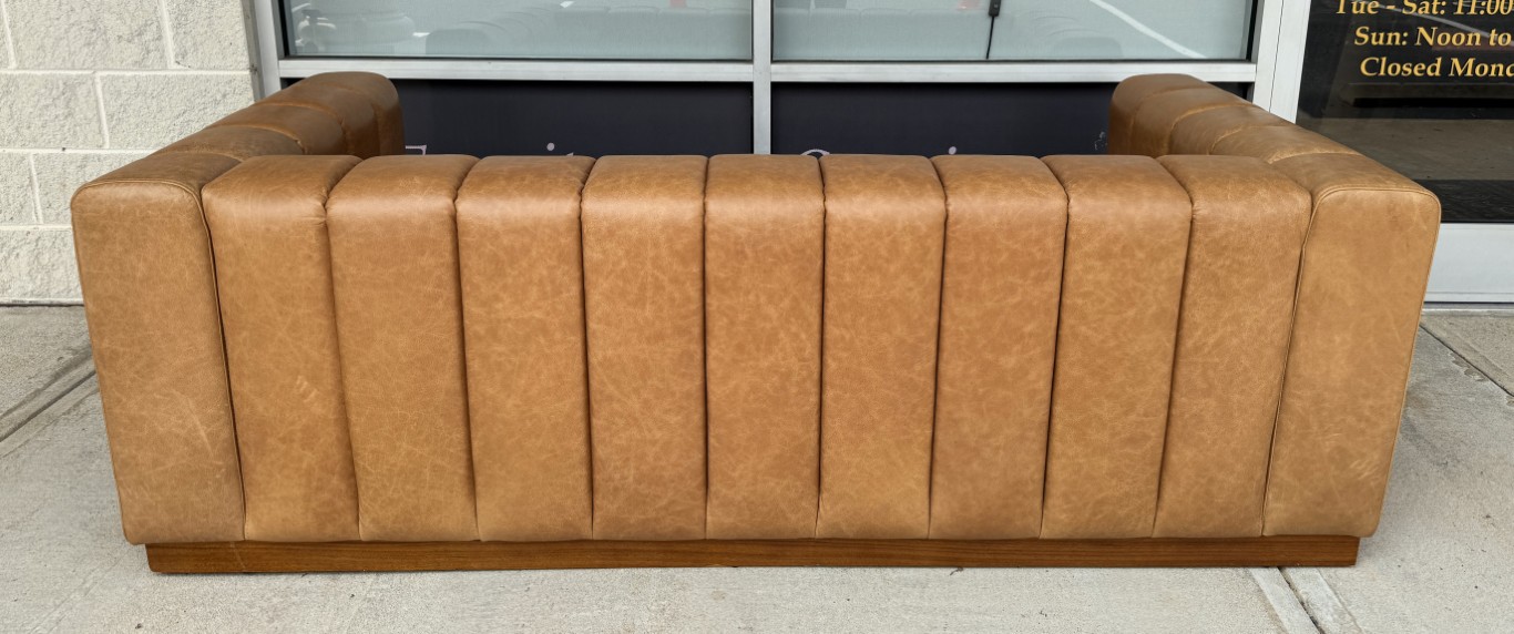 CB2 Forte 81-Inch Channeled Saddle Leather Sofa with Walnut Base CB2 Forte 81-Inch Channeled Saddle Leather Sofa with Walnut Base
