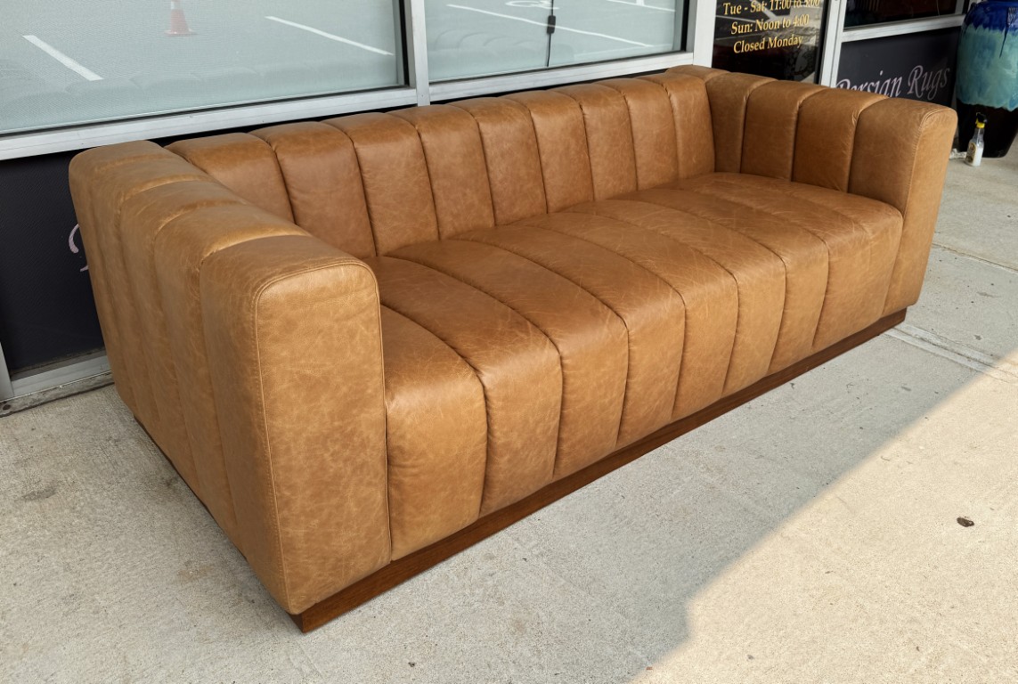 CB2 Forte 81-Inch Channeled Saddle Leather Sofa with Walnut Base CB2 Forte 81-Inch Channeled Saddle Leather Sofa with Walnut Base