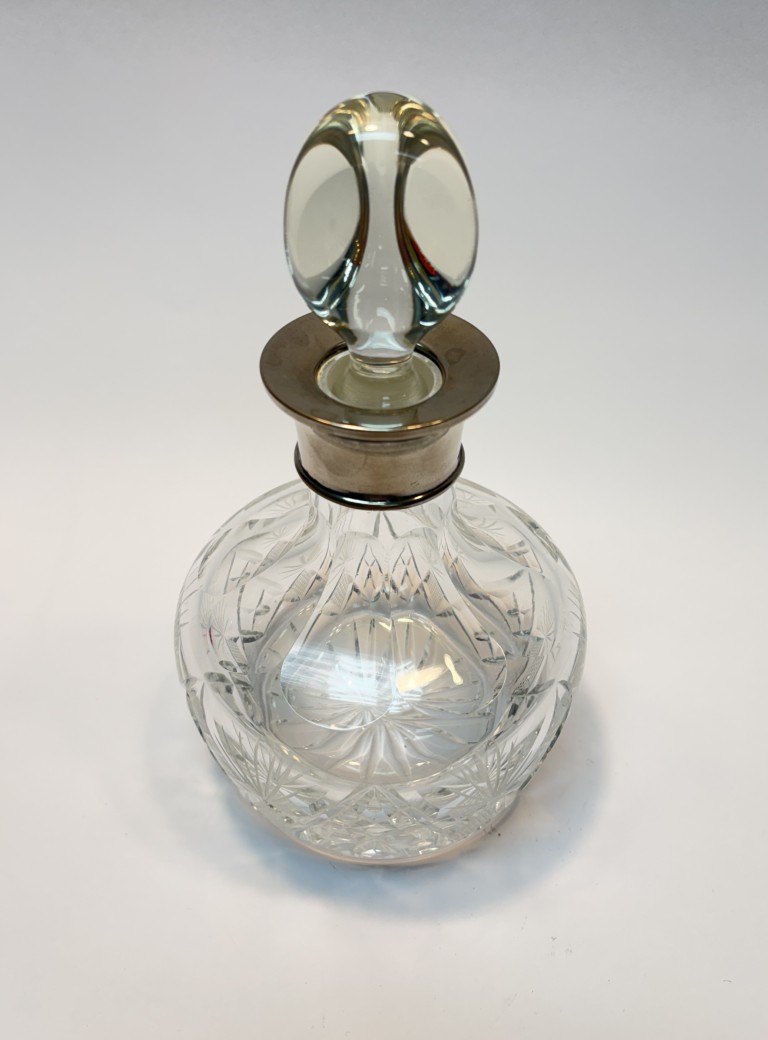 Antique Cut Crystal Decanter with Silverplate Collar and Heavy Triangular Stopper Antique Cut Crystal Decanter with Silverplate Collar and Heavy Triangular Stopper