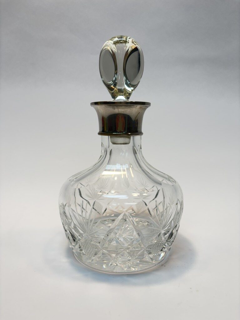 Antique Cut Crystal Decanter with Silverplate Collar and Heavy Triangular Stopper Antique Cut Crystal Decanter with Silverplate Collar and Heavy Triangular Stopper